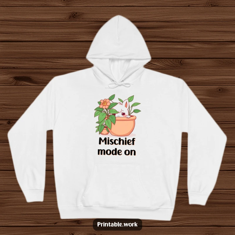 Funny hidden plant hoodie featuring a mischievous character concealed behind a large potted plant, perfect for undercover fun and warm cuddles.