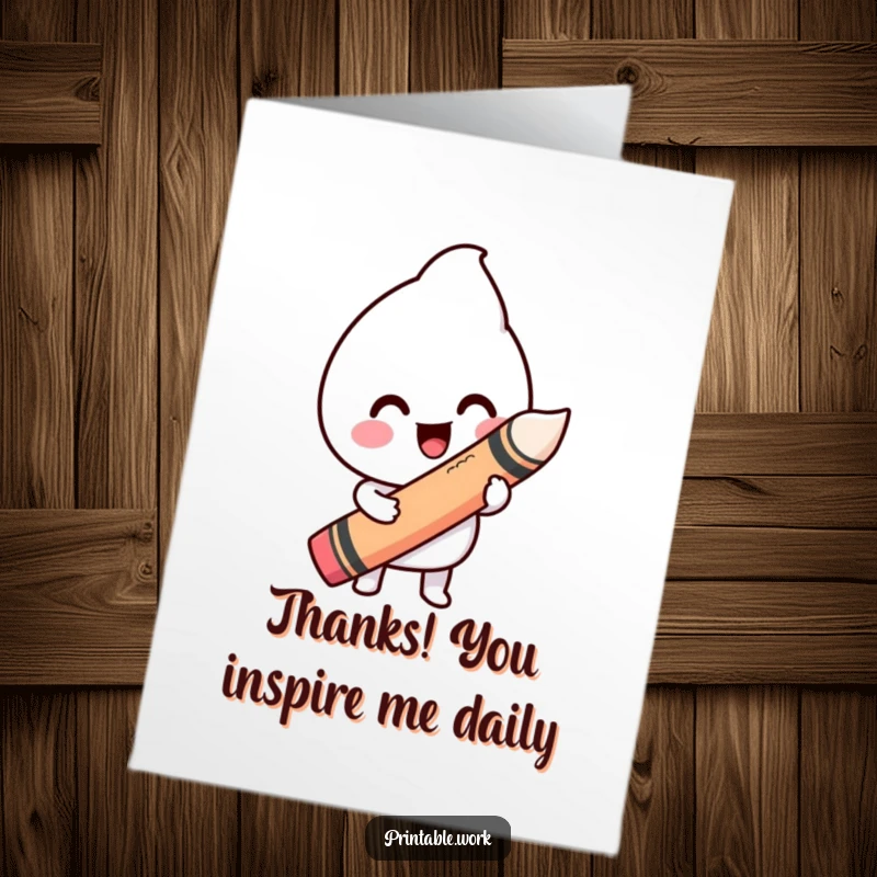 Funny Free Printable Thank You Card: A happy Kawaii creature draws a charmingly wiggly line with a giant crayon, sending thanks.