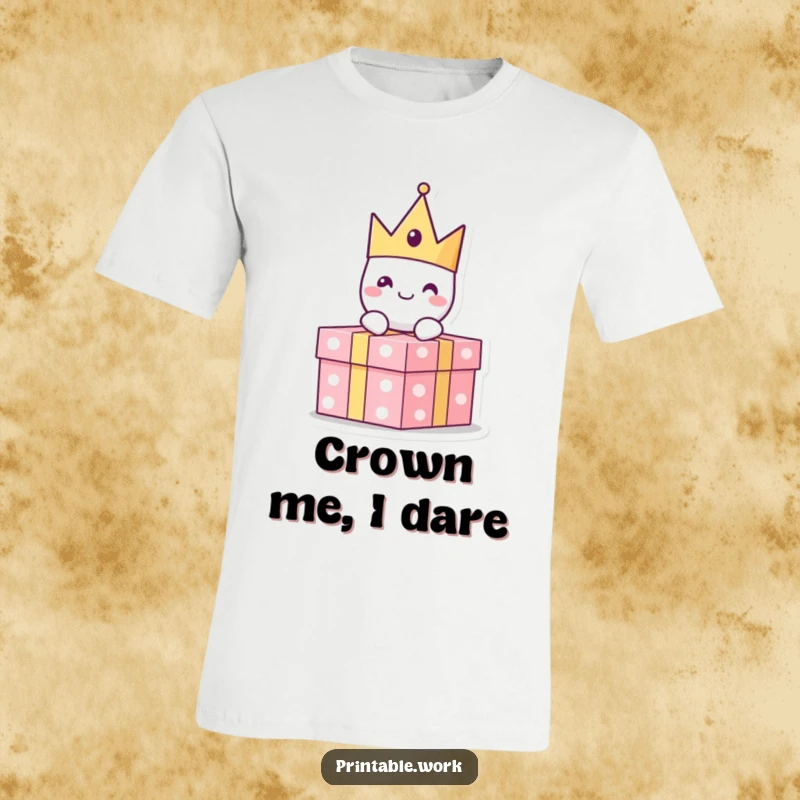 Funny paper crown character with a cheerful expression sitting atop a present, printed on a t-shirt, embodying celebration.